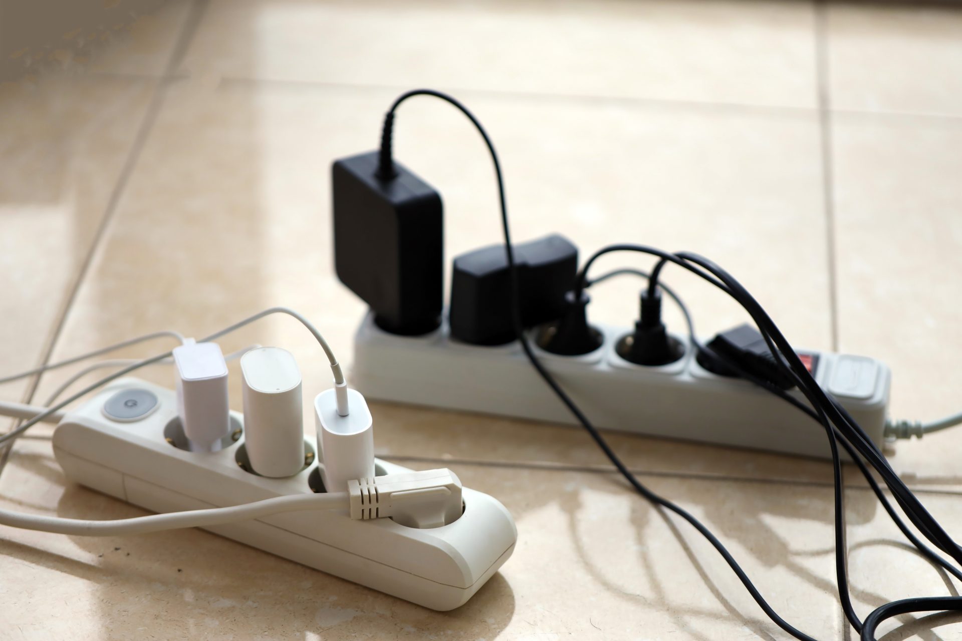 Power strips with different items plugged in.