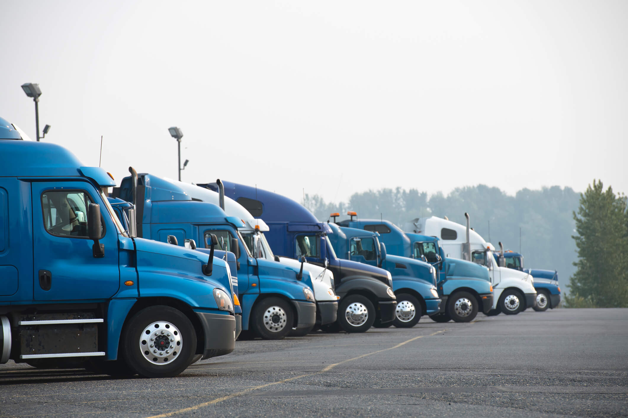 Semi-trucks parked next to each other | Fleet Fuel Cost