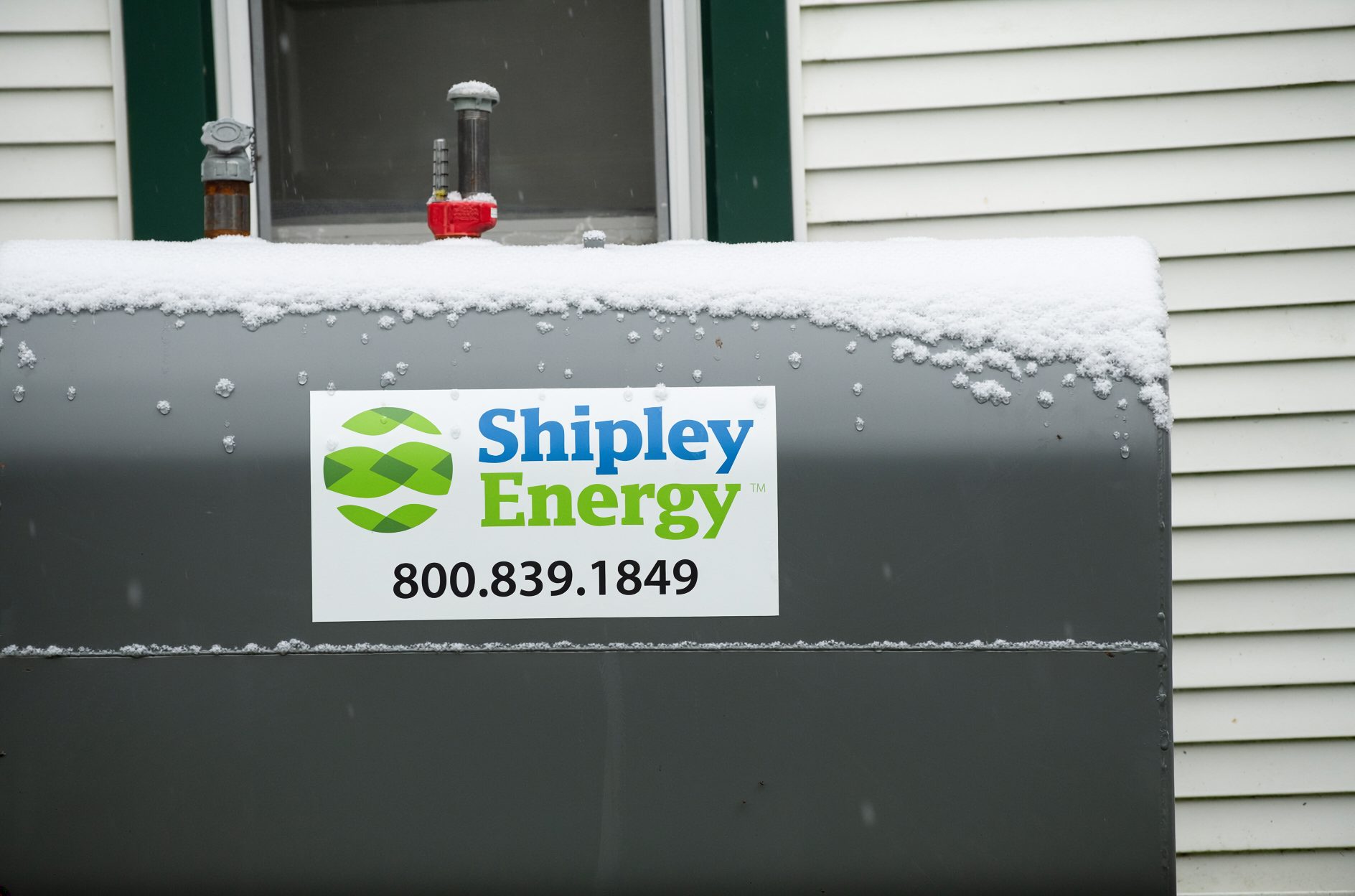 A Shipley Energy heating oil tank in snow
