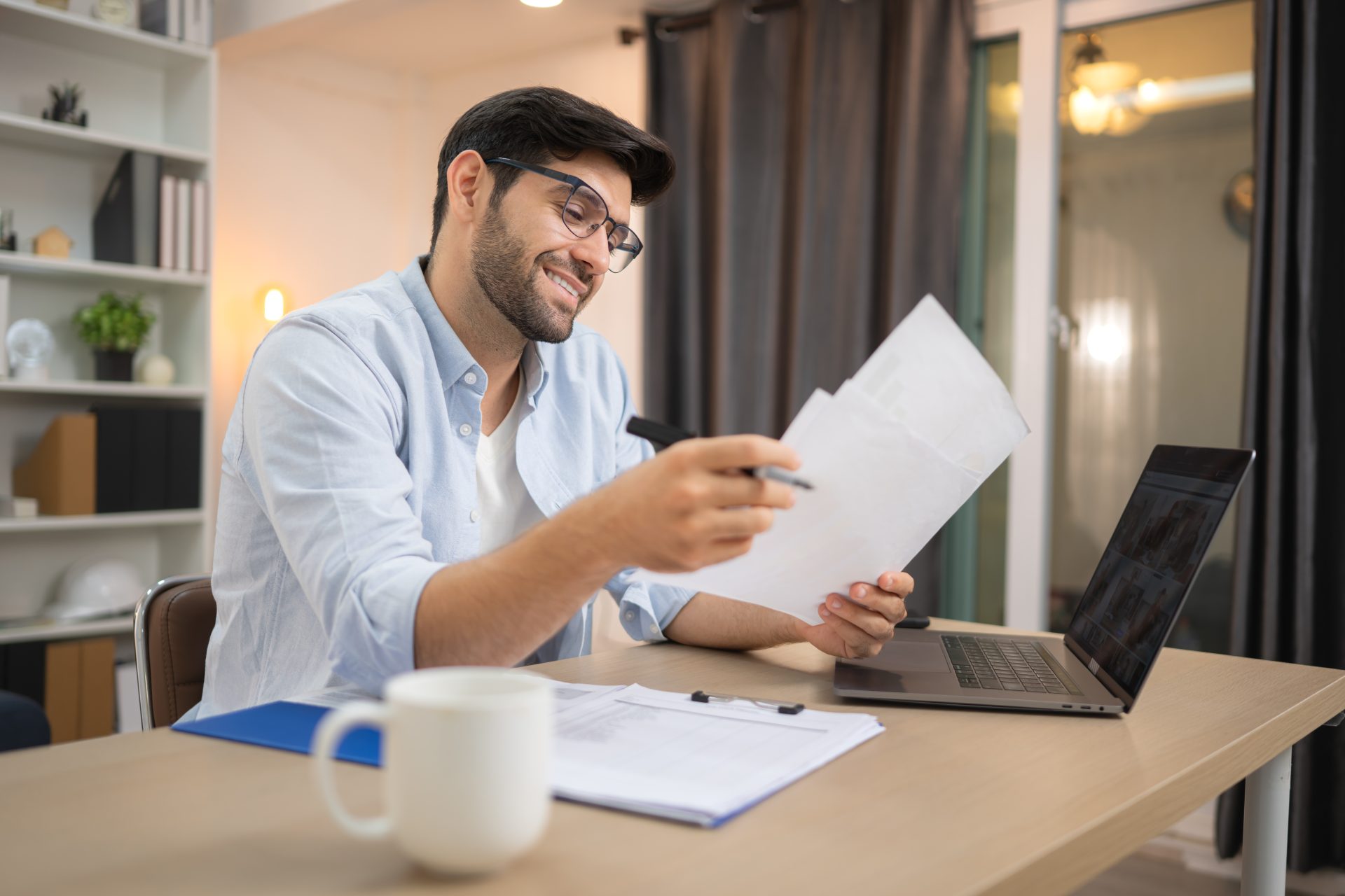 Young man paying his home heating bill